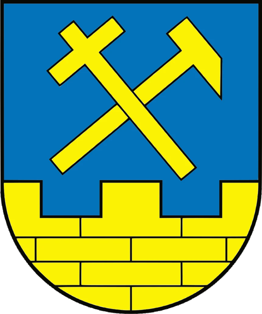 Gelbe Backsteinmauer und Hammer und Meisel auf blauem Grund.