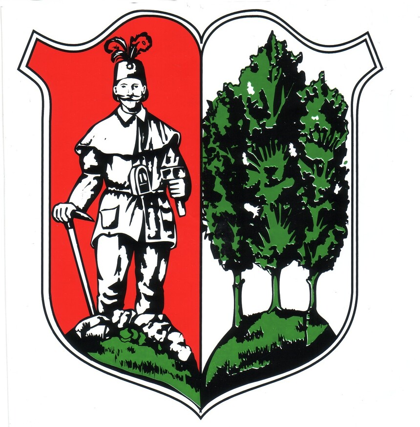 Das Wappen besteht aus zwei Teilen: links ein Bergmann auf rotem Hintergrund, rechts drei grüne Bäume auf weißem Hintergrund.